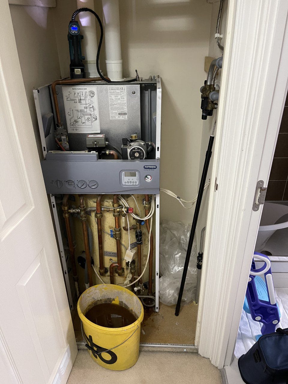 Boiler repair and service in Norwich with boiler casing removed for inspection and maintenance