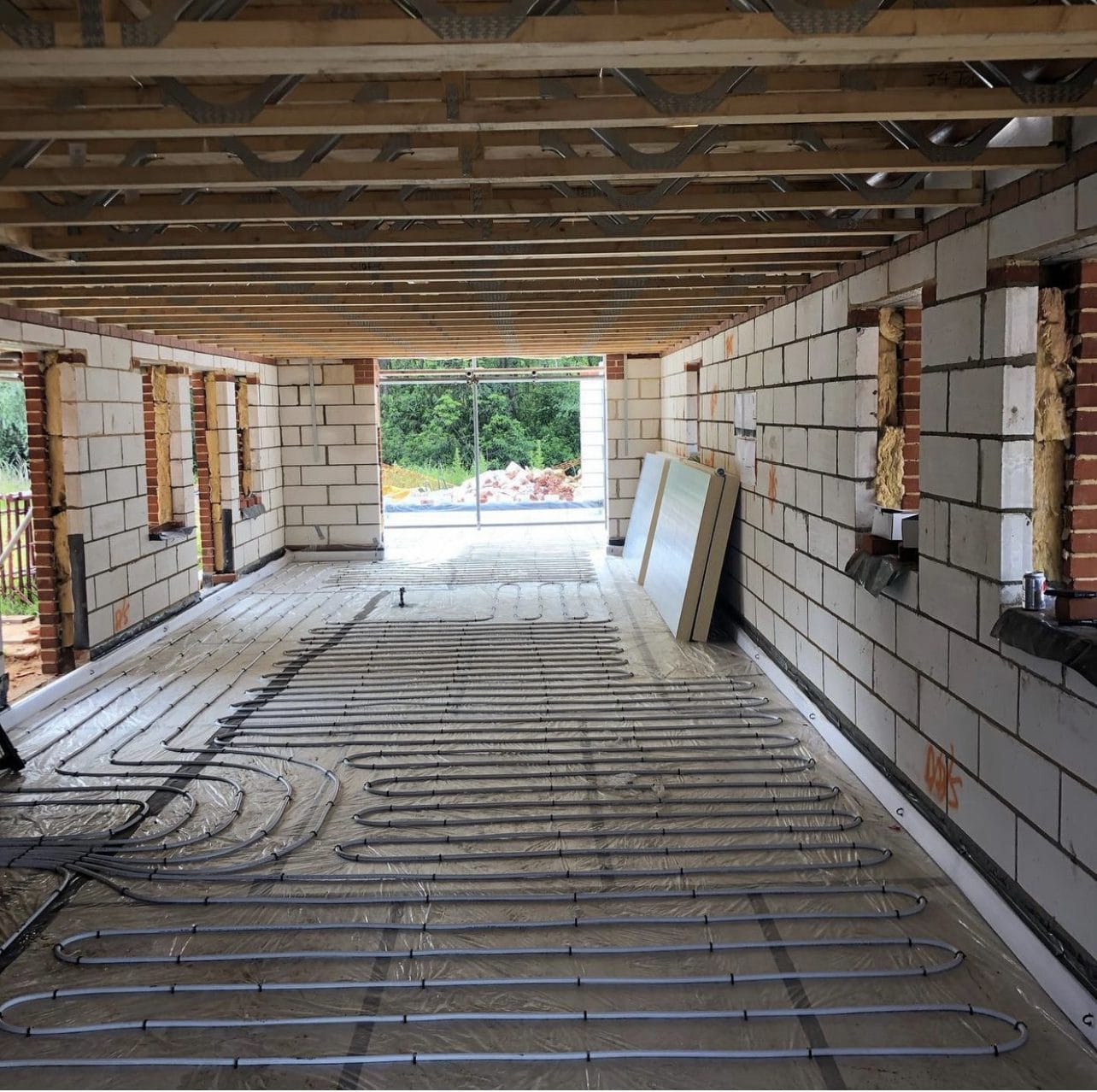 Underfloor heating installation in Norfolk with pipework fitted across a new-build floor