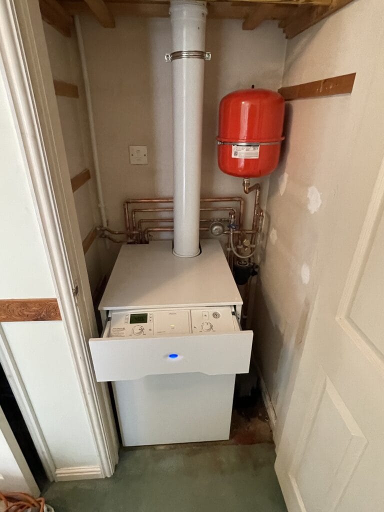 Oil boiler installation in Norfolk with flue, expansion vessel and copper pipework
