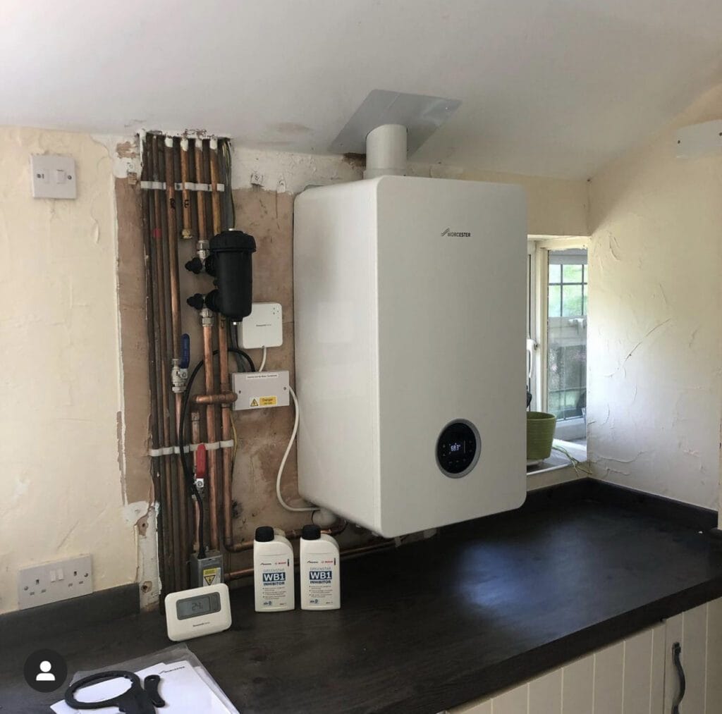 Worcester Bosch System boiler installation in Norwich with copper pipework and heating controls