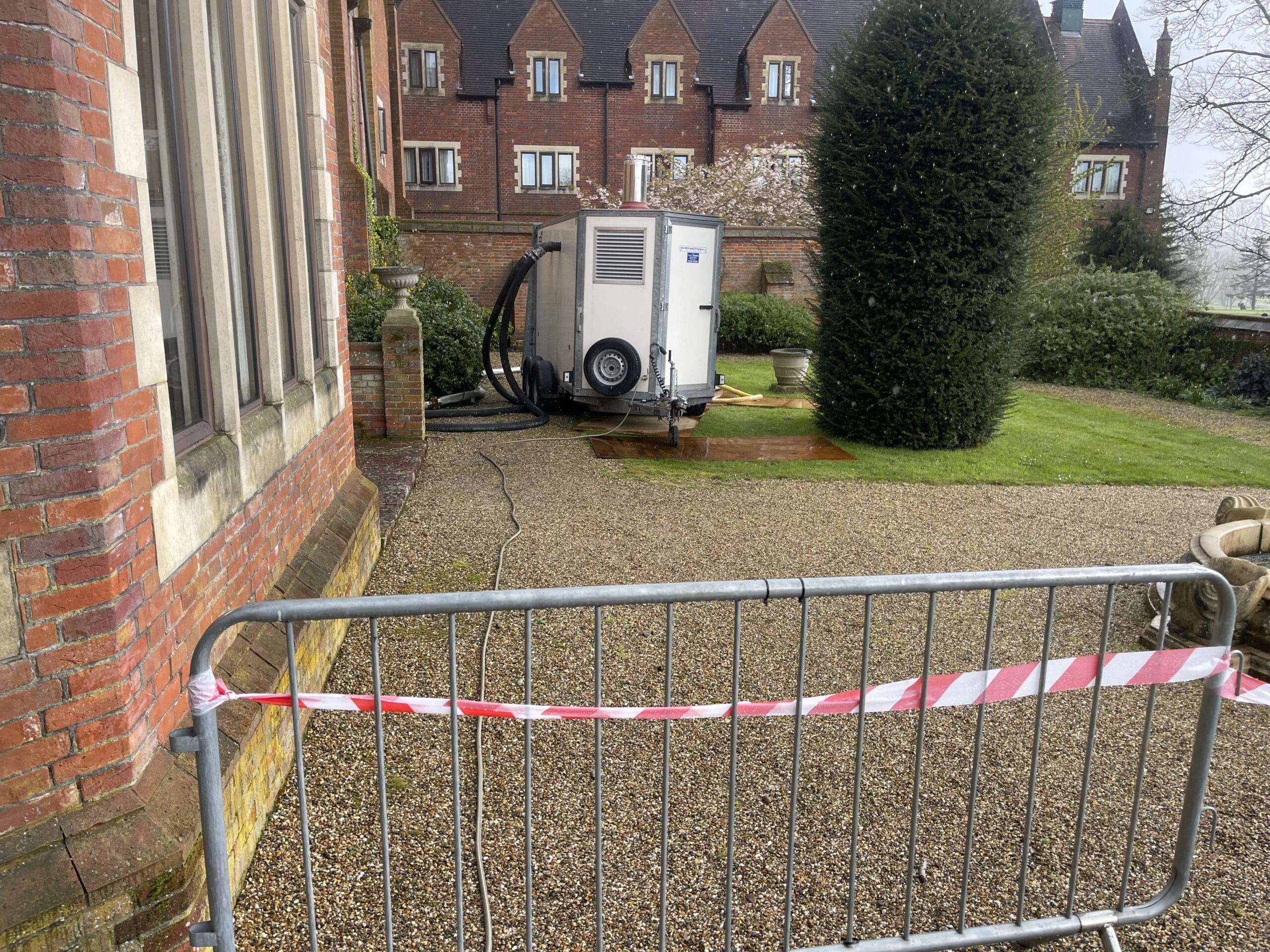 Temporary boiler hire unit installed outside a commercial property in Norwich