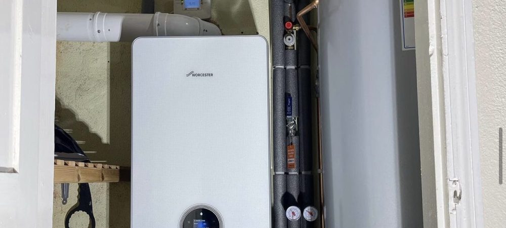Heating engineer comparing gas oil and LPG boiler options for a Horning property