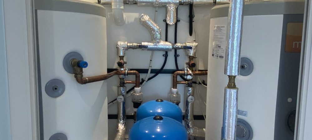 Commercial plumbing and heating engineer working at a Long Stratton mixed-use premises