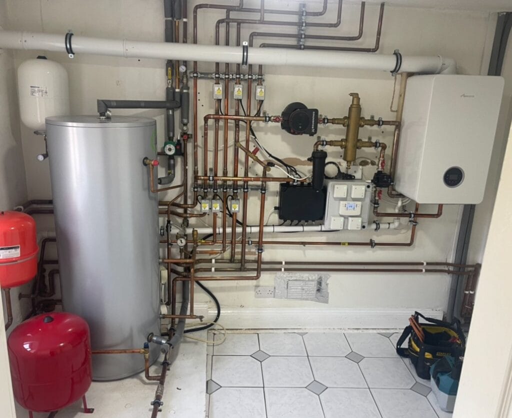 Worcester Bosch gas boiler installation with copper pipework, heating controls, pump and central heating filter